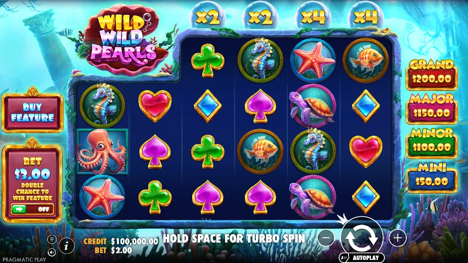 Pantalla de Wild Wild Pearls con perlas y criaturas en un arrecife brillante
